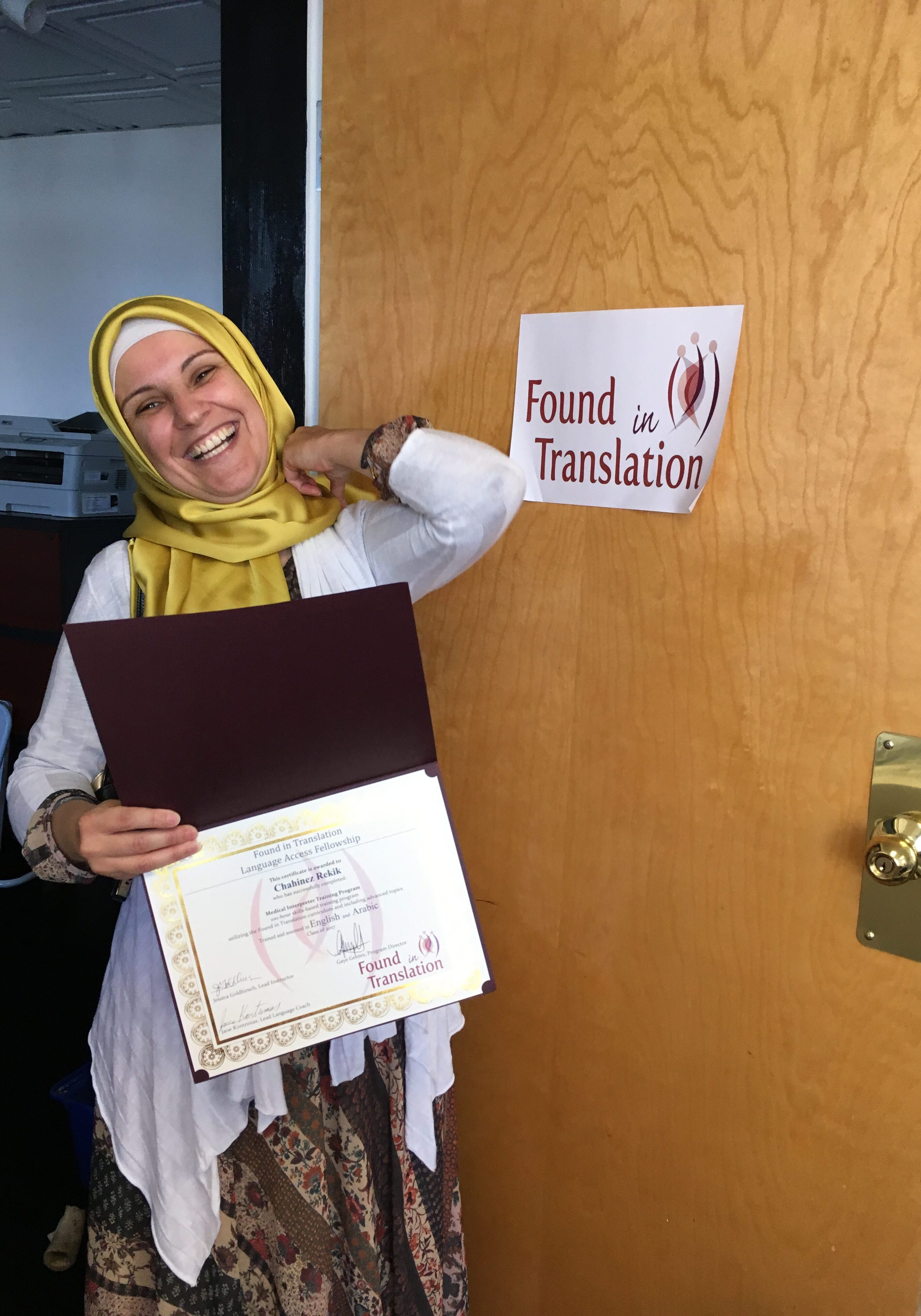 A graduate with her certificate!